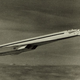 The Tu-144 in flight, with its nose cone lowered. The cone was raised lowered during landing to allow the pilots to see the runway, but raised in flight. (San Diego Air and Space Museum)